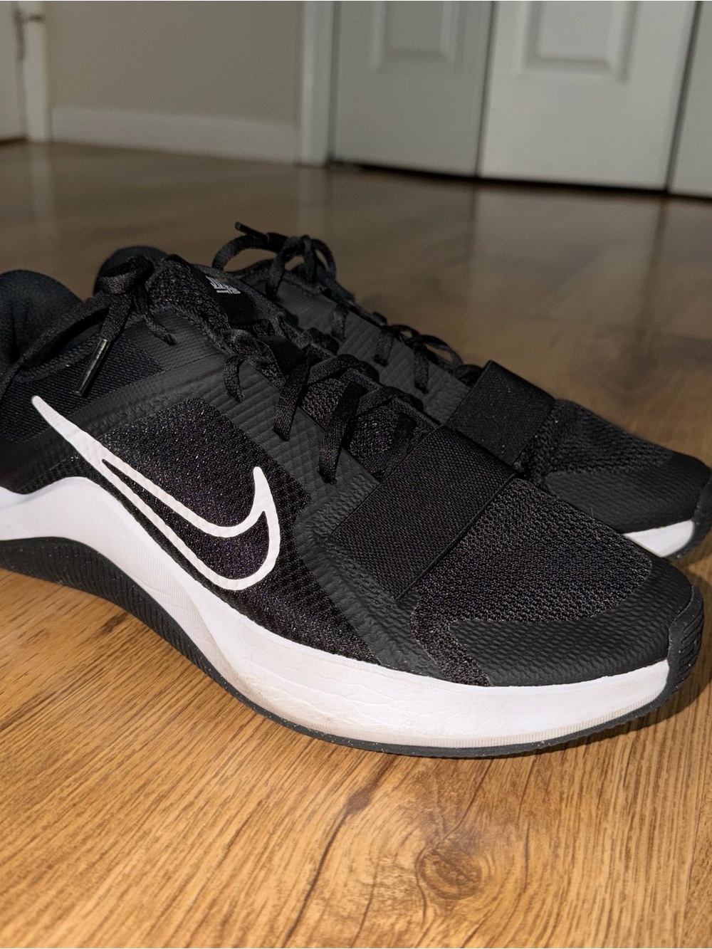 Nike Men’s Black and White Cross-Training Sneakers